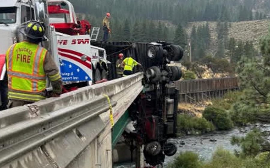 WATCH:  18-wheeler outside California's Lake Tahoe left dangling from overpass after crash