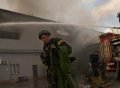 Hundreds evacuate after Russian strike on warehouse near Kyiv kills at least 27