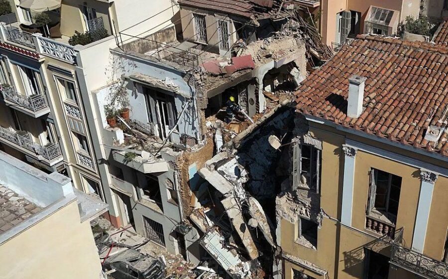 One dead and five missing after explosion destroys building close to Acropolis in Athens