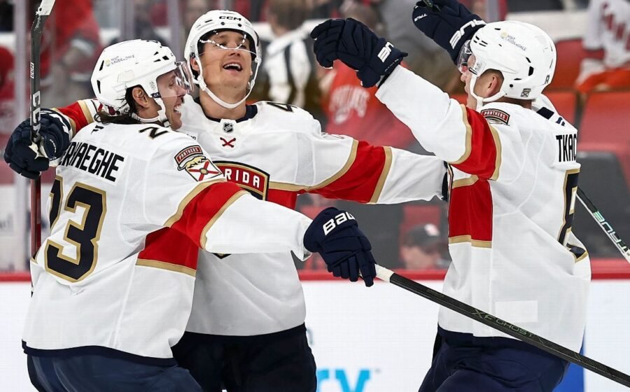 Canes lift banner, Panthers win 'playoff-style' opener in OT