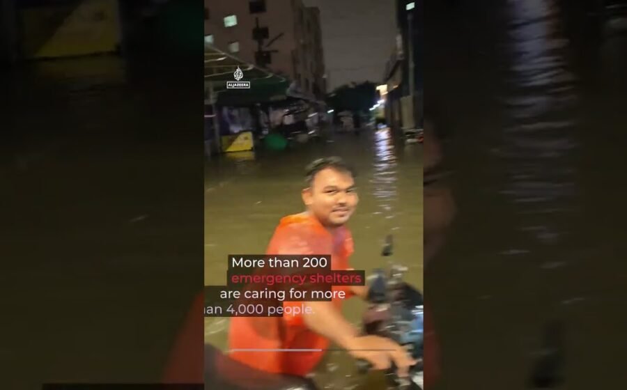 Bangkok declared disaster zone after heavy rains submerge road