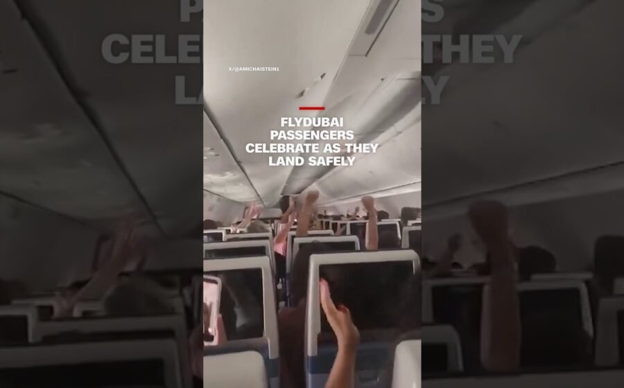 Flydubai passengers celebrate as they land safely