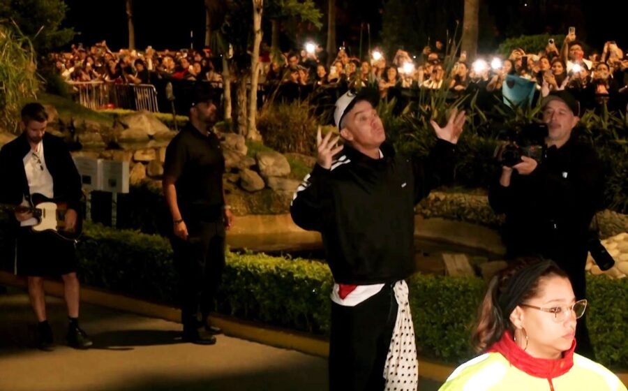 Robbie Williams sings with fans outside hotel after show cancelled in Peru