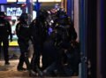 Live: A 'record' 855 people detained in Paris during protests, police say