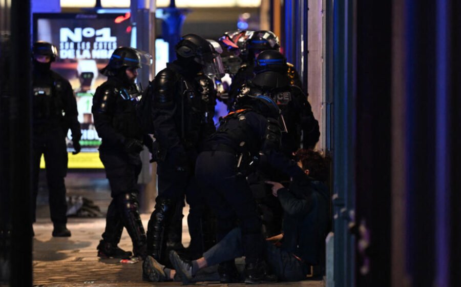 Live: A 'record' 855 people detained in Paris during protests, police say