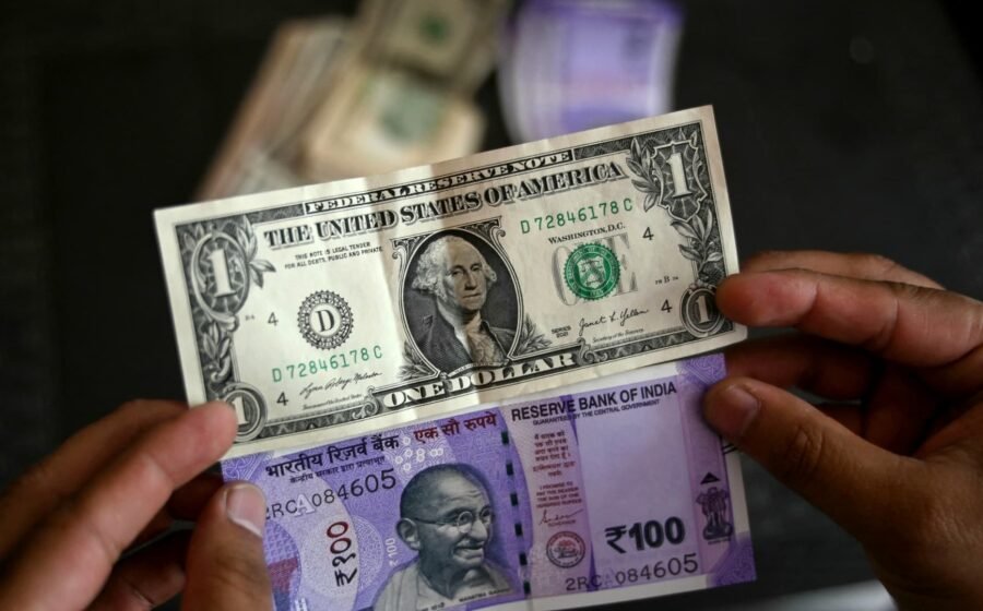 India's rupee forecast to weaken toward 100-per-dollar level even as RBI pushes back