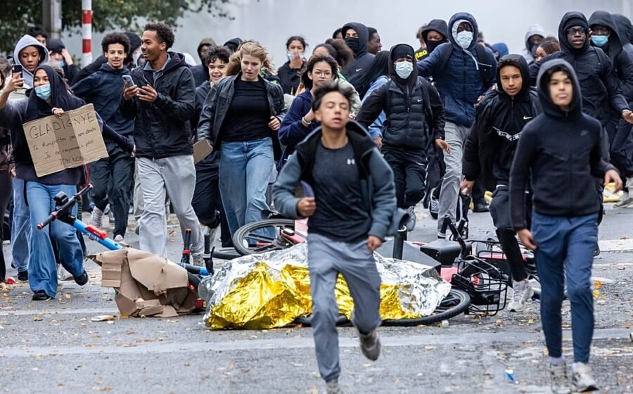 Police clash with protesters in Brussels as thousands march against spending cuts