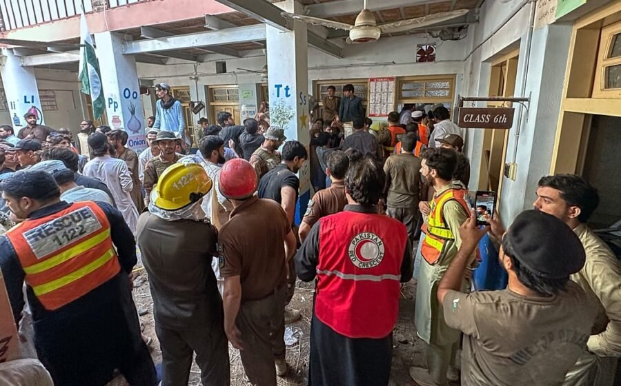 School roof collapse kills teacher and at least 27 children in northwest Pakistan