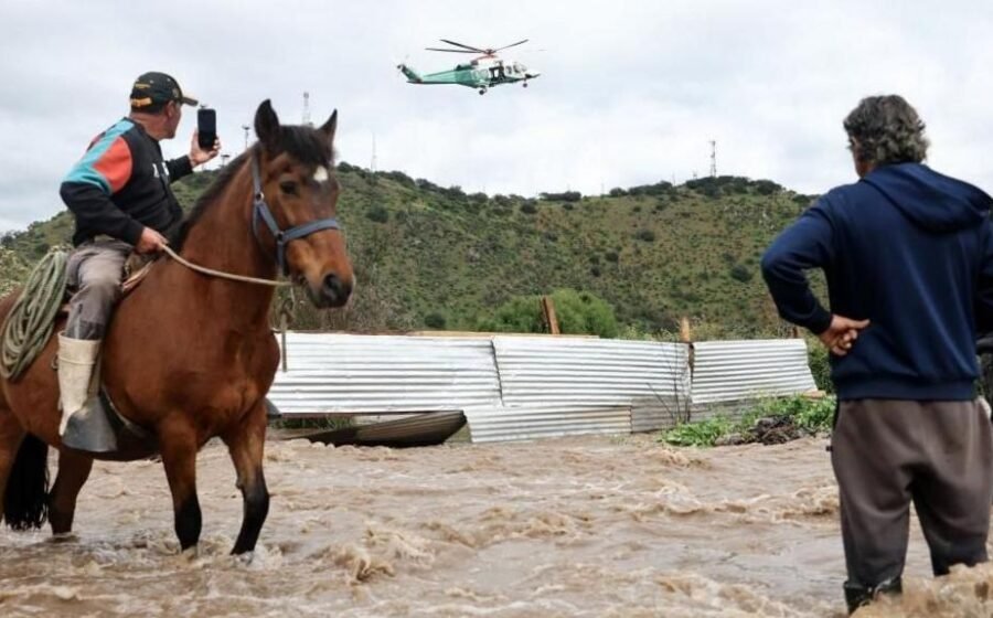 Residents airlifted to safety after flooding in central Chile