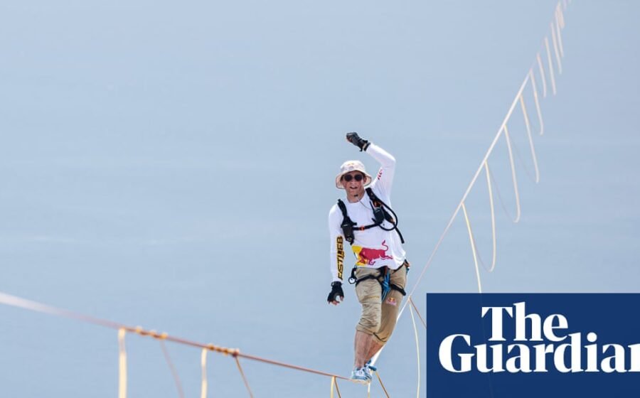 Daredevil Jaan Roose prepares to walk slackline high above central Seoul