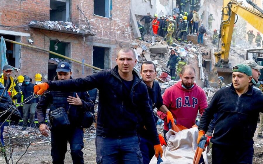 Children killed while they slept as Russian missile kills 19 in block of flats