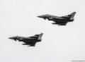 Ukraine apologizes after a suspected drone crashes in Lithuania, damaging a moving car.