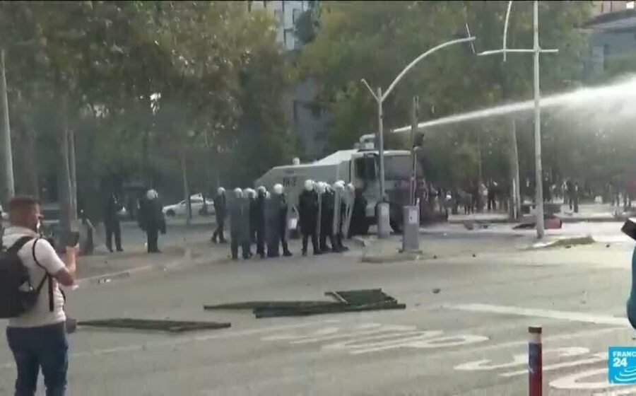 Albania's leader defies calls to resign as student protesters rampage in capital