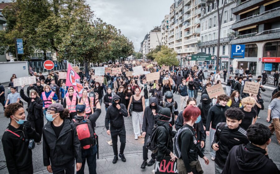 Police, demonstrators clash on sidelines of mass French protests