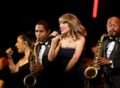 Taylor Swift Fires Up Academy Gala With Four Songs in Her First Band Performance Since the Eras Tour