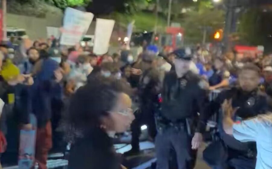 New York police push politician to ground during anti-ICE protest