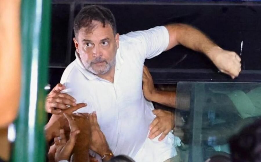 India's opposition leader dragged on to bus as police break up protest