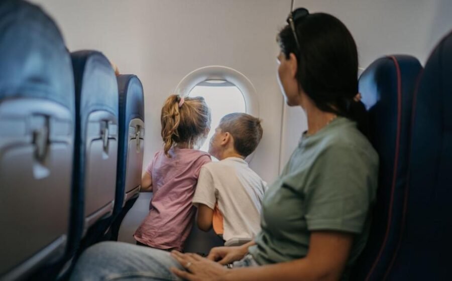 Move to stop charges for parents to sit by children on flights