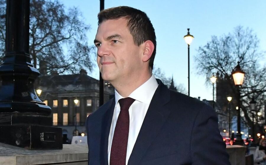 Ex-top official Robbins reaches settlement with government over sacking