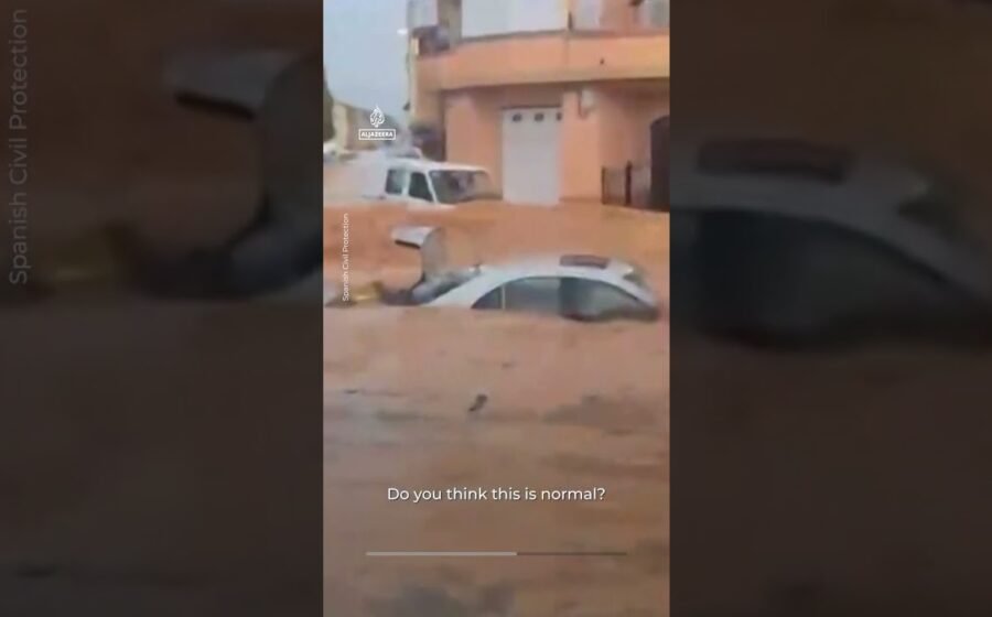 Floods sweep cars through streets after intense rain in Spain
