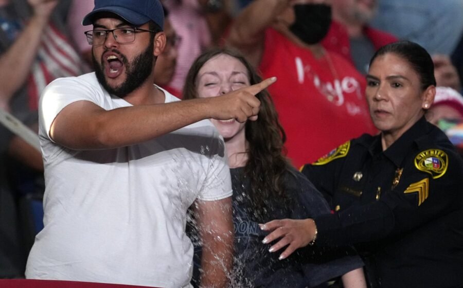 Trump interrupted by protesters as he fights to rally Texas voters